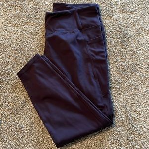 Danskin plum colored leggings with pockets